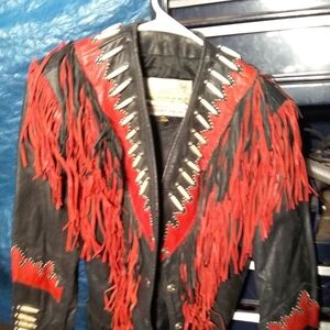 Leather vintage jacket w/bone an fringe